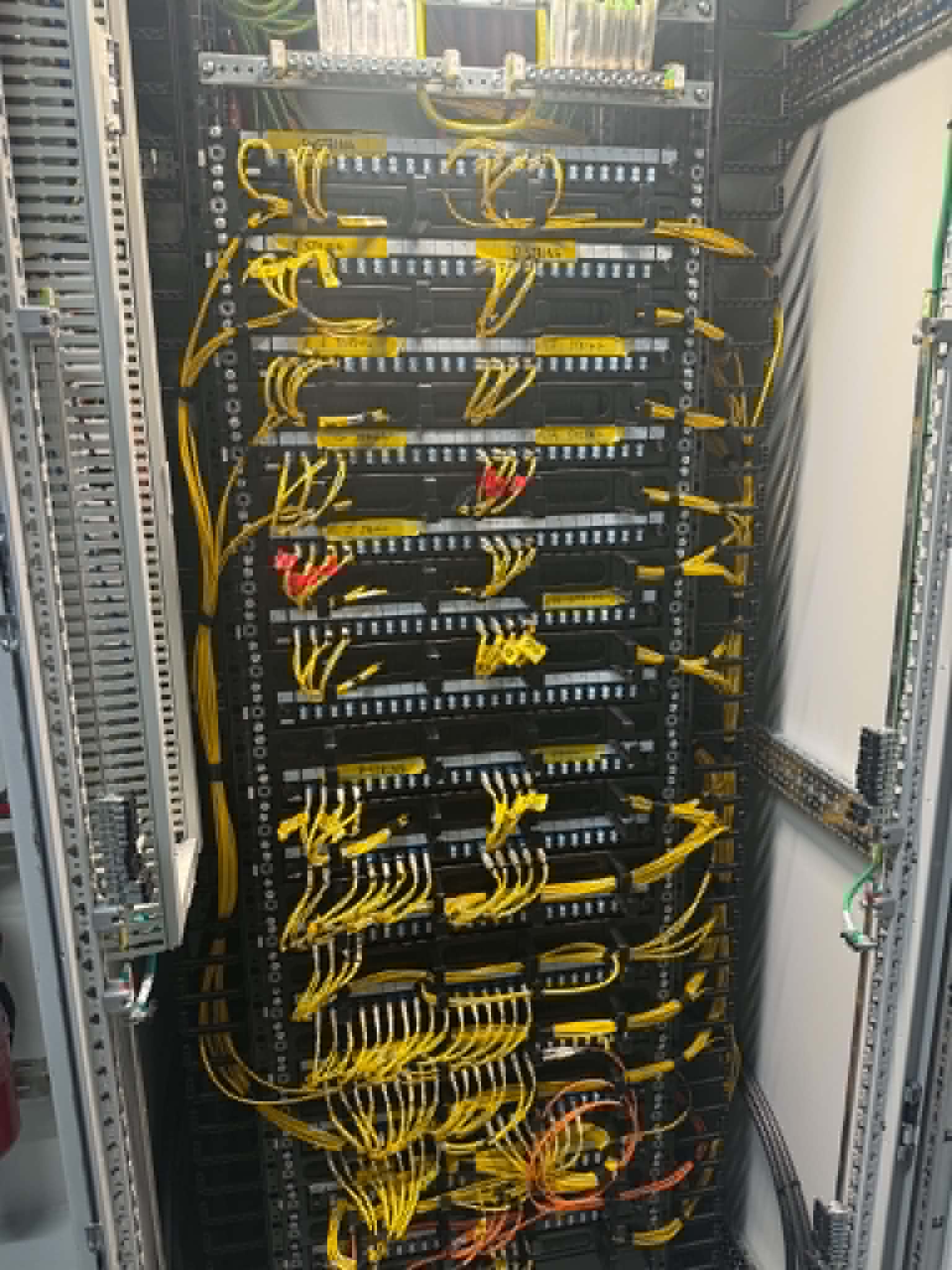 Fibre testing equipment and rack installed by Smart WiFi Solutions across the United Kingdom